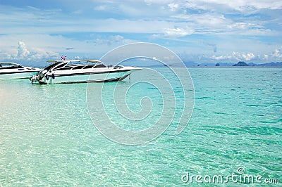 Motor boats on turquoise water of Indian Ocean