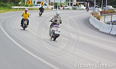 Motorbike on the curve road with its driver