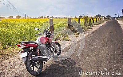 Motorbike in between fields and roads