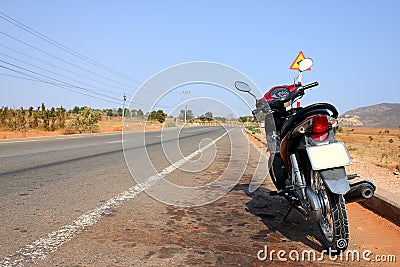 http://thumbs.dreamstime.com/x/motorbike-road-scene-vietnam-19005596.jpg