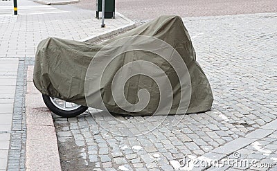 Motorcycle in a cover.
