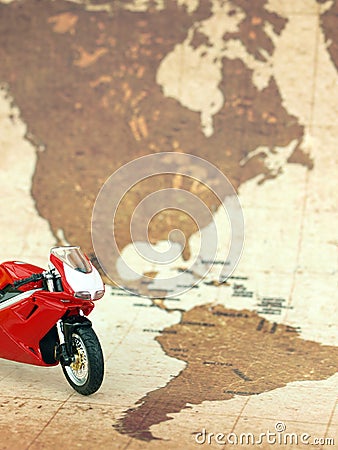 Motorcycle over world map