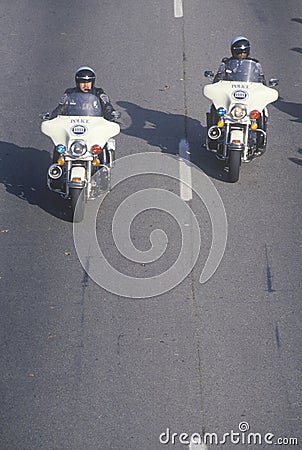 Motorcycle police officers riding on freeway