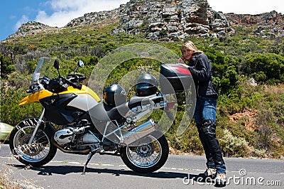 A motorcycle portrait of a young woman.