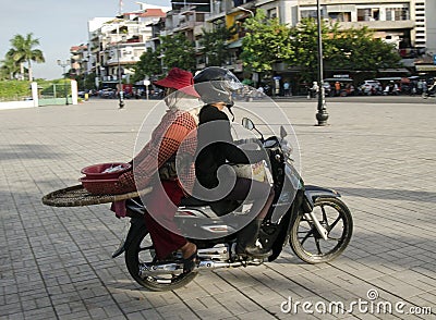 Motorcycle rider sits backwards