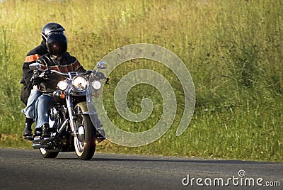 Motorcycle Riders on a Street Hog