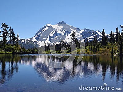 MOUNT BAKER REFLECTION IN A SPARKLING ALPINE LAKE