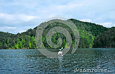 Mountain Lake / Man Kayaking