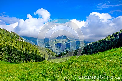 Mountain Landscape With Puffy Clouds