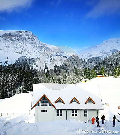 Mountain lodge in winter snow