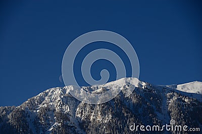 Mountain with snow and moon