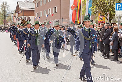 Mountain troops salute at the march in a parade