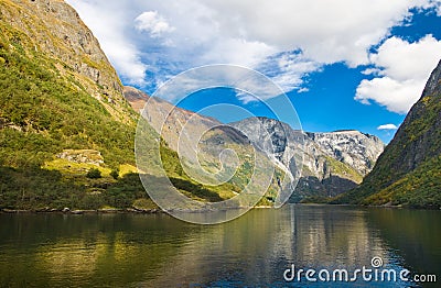 Mountains and norwegian fjord in autumn