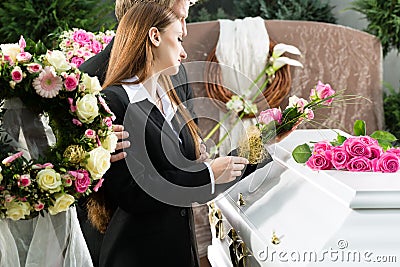 Mourning People at Funeral with coffin