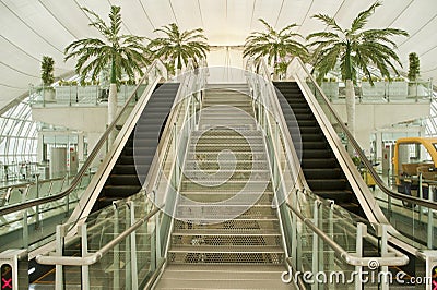 Moving escalator in the business airport ,asia.