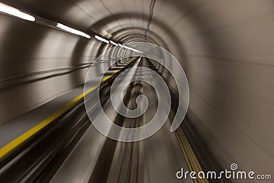 Moving fast through a modern, conrete tunnel