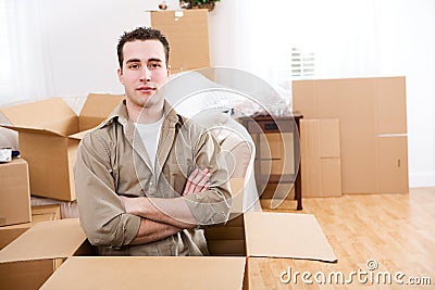 Moving: Man Sits Inside Empty Packing Box