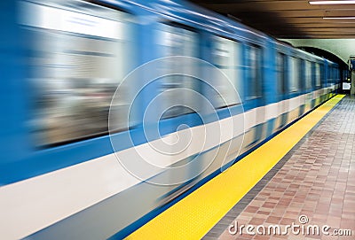 Moving subway train and Motion blur with an empty subway platfor