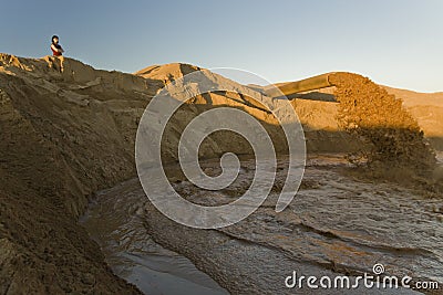 Mud Coming Out Of Big Pipe Stock Photos 