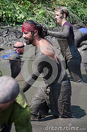 Muddy people walking