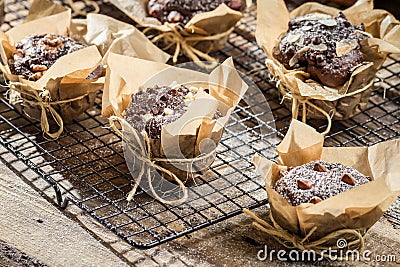 Muffins with icing sugar and almonds