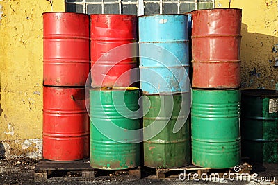 Multicolored old oil barrels