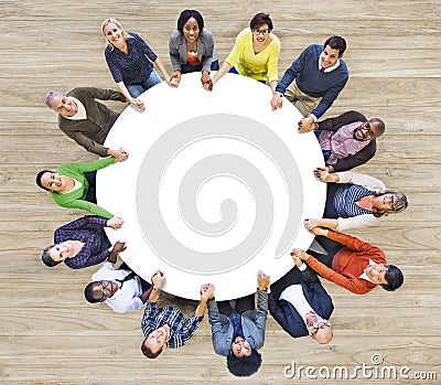 Multiethnic People Forming a Circle Holding Hands