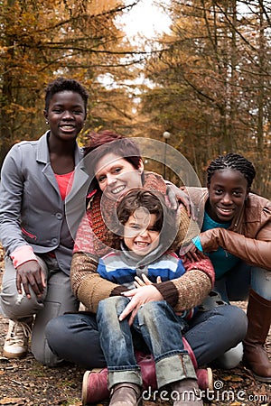 Multiracial family in the autumn