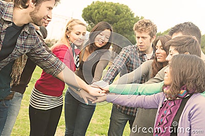 Multiracial Students whit hands on stack