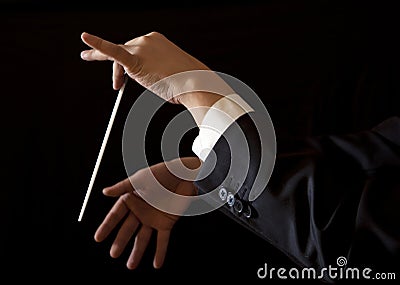 Music male director holding stick