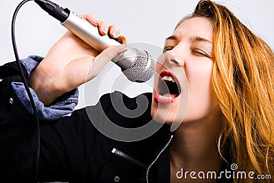 Music singer - woman with microphone