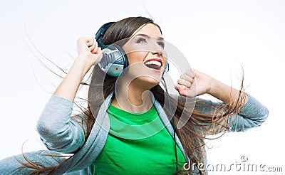 Music teenager girl dancing against isolated white background