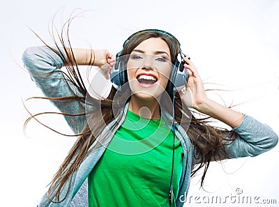 Music teenager girl dancing against isolated white background