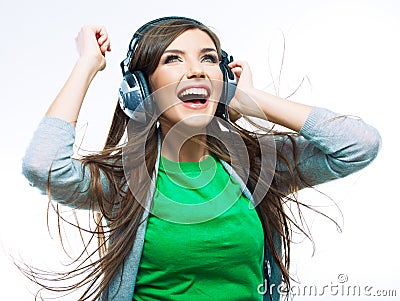 Music teenager girl dancing against white background