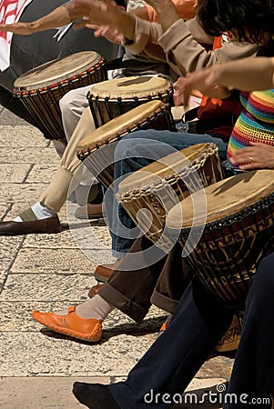 Musicants playing drums during street concert