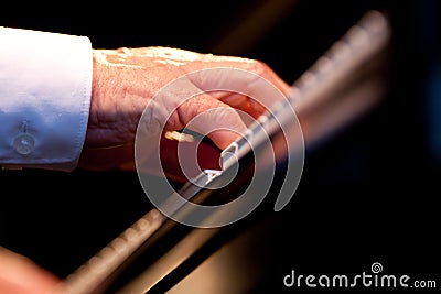 Musician hand playing piano