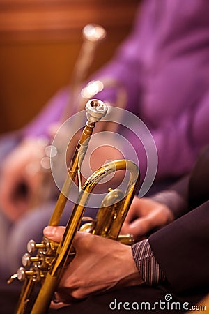 Musician holding a pipe