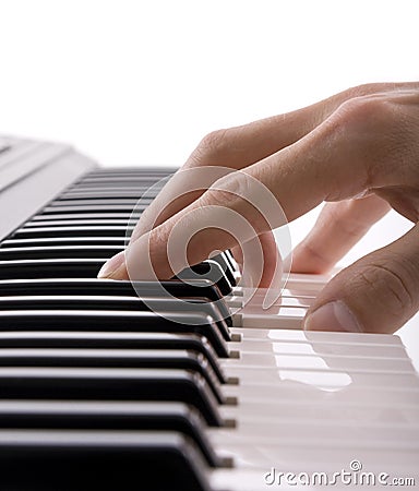 Musicians hand playing the piano