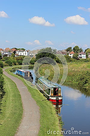 Narrow boats moored on Lancaster canal Hest Bank