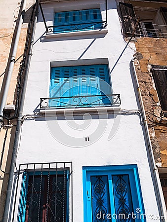 Narrow Mediterranean house facade