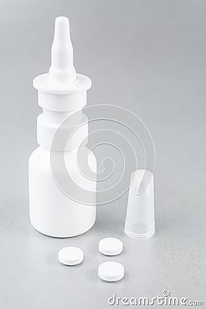 Nasal spray and white pills