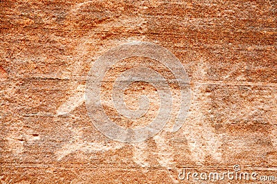 Native American petroglyph on canyon wall