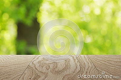 Natural oak table template with blurred oak tree on background