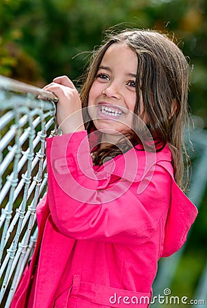 Natural portrait of a happy pretty little girl