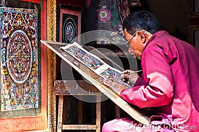 Nepalese artist creates traditional mandala painting