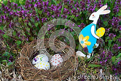 Nest with easter eggs and Easter bunny