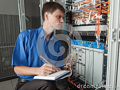 Network engineer in server room