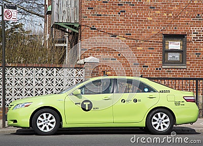 New green-colored Boro taxi in Brooklyn, NY