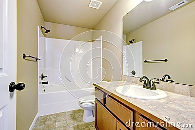 New home bathroom with shower and bath.