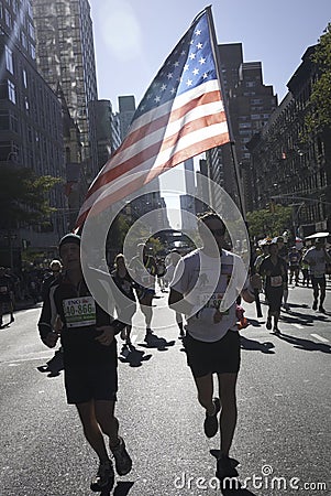 New York City Marathon runner with American Flag
